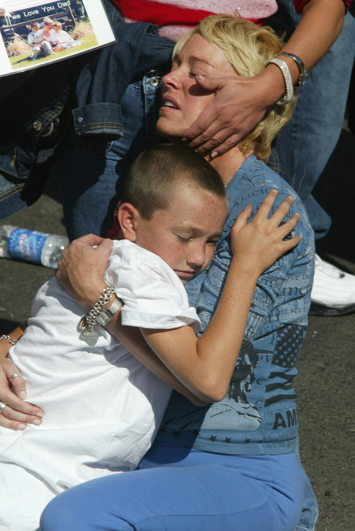 Families of the 9/11 victims at Ground Zero 1 year later